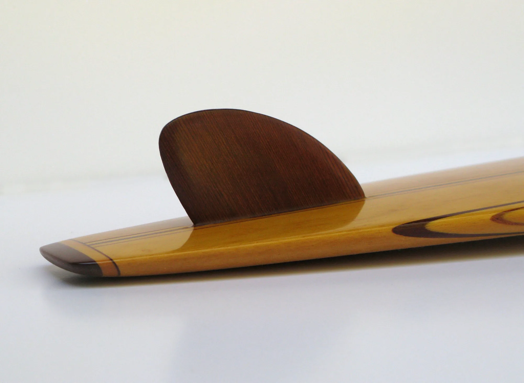 Pat Curren redwood and balsa gun photo: Merson