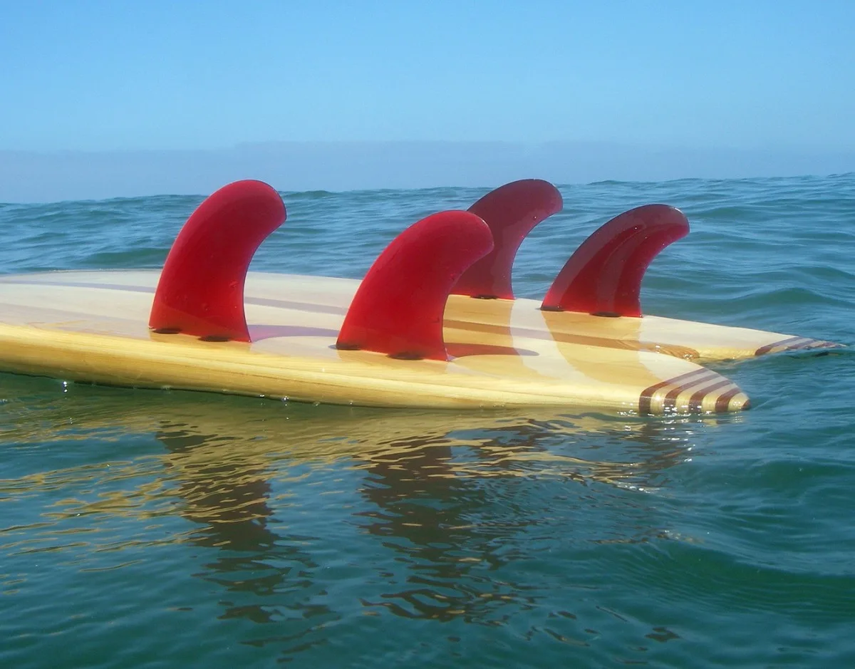 Merson hollow wood quad fish, Jack Jensen fins, FCS plugs photo: Merson